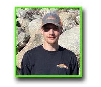 Photo of Riley Winters SERVPRO Crew Chief, male employee with hat on